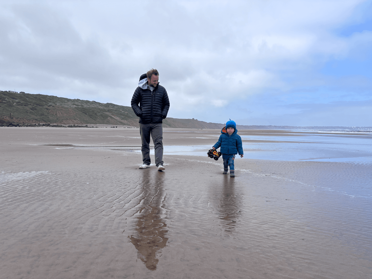 Marc And His Son On The Beach
